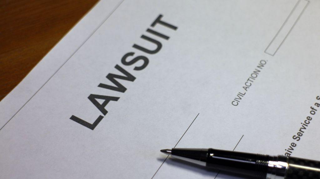 Lawsuit Document on a Table