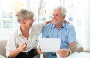 Older Couple Looking at Life Insurance Policy