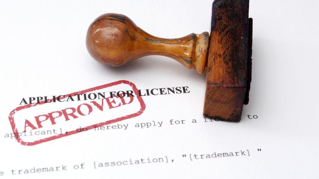 Application for License Document with Red Approved Stamp
