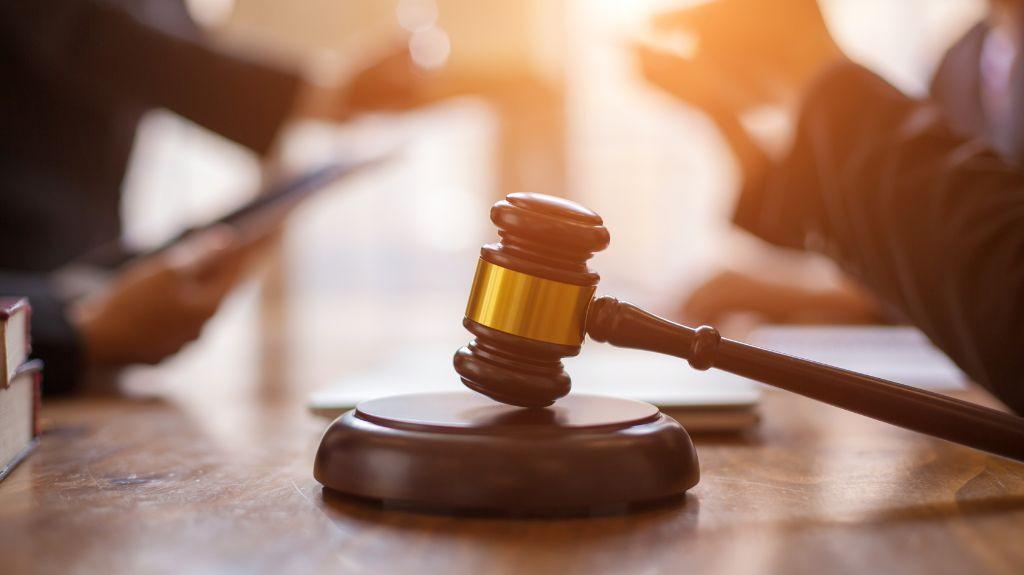 Gavel on a Desk with Sunlit Background