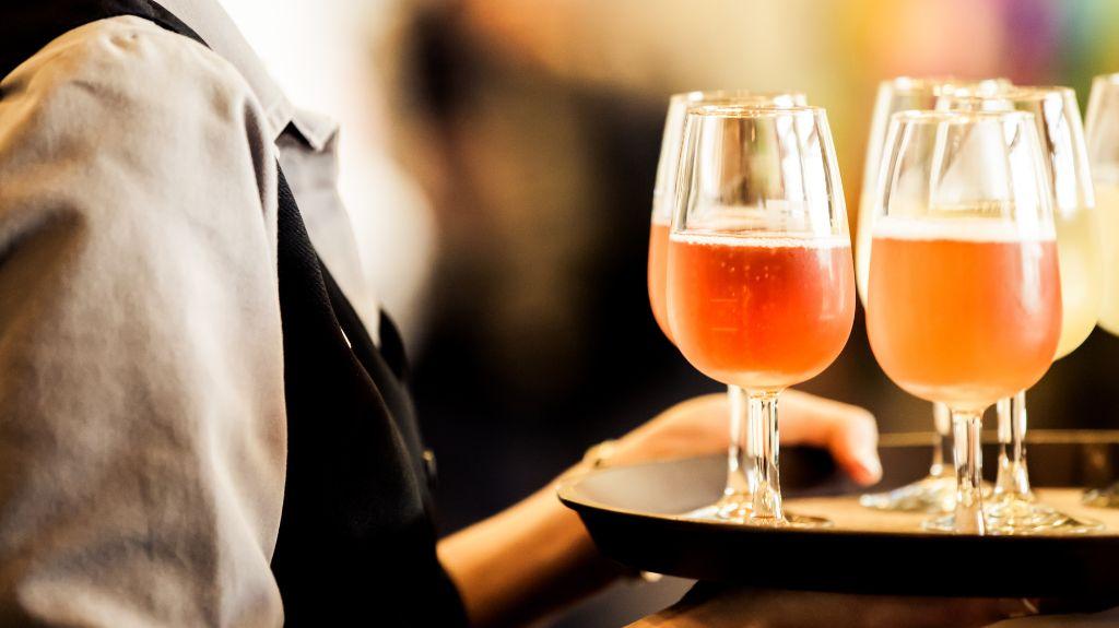 Server with Tray of Alcoholic Drinks