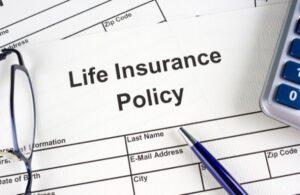 Life Insurance Policy Document with Pen